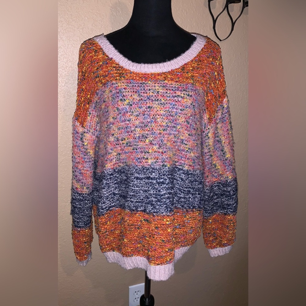 Super soft and warm multi color sweater.